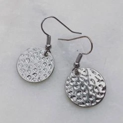 Flo Gives Back 15% To Women In Need Small Hammered Circle Rhodium Earring