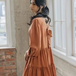 Among The Brave Fashion Deluxe Copper LS Balloon Sleeve Tie Back Tiered Mini Dress