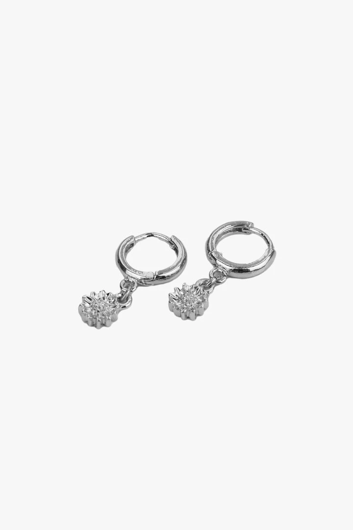 Flo Gives Back 15% To Women In Need Accessories Daisy Rhodium Huggie Hoop Earrings 3 Flo Gives Back 15% To Women In Need Accessories Daisy Rhodium Huggie Hoop Earrings