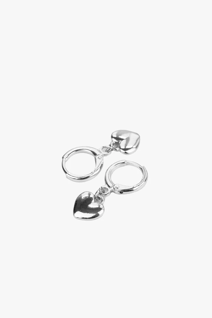 Flo Gives Back 15% To Women In Need Heart Rhodium Huggie Hoop Earrings Accessories 3 Flo Gives Back 15% To Women In Need Heart Rhodium Huggie Hoop Earrings Accessories