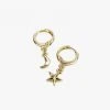 Flo Gives Back 15% To Women In Need Moon And Star Gold Huggie Earrings Accessories