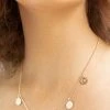 Flo Gives Back 15% To Women In Need 5 Coin Pendant Gold Necklace Accessories 2 Flo Gives Back 15% To Women In Need 5 Coin Pendant Gold Necklace Accessories